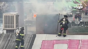 Firefighters respond to commercial fire next to Denver7 building