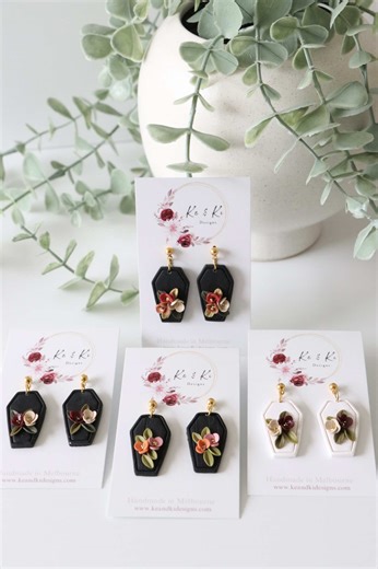 Delicate yet daring 🌹💀 These coffin earrings blend spooky elegance with handcrafted charm — made for the soft souls who love a touch of mystery