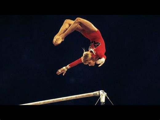 This description highlights a significant, highly-rated gymnastics element that revolutionized the sport