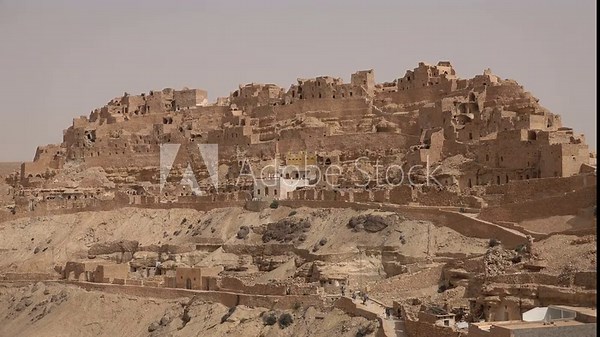 View of traditional Berber village of Takrouna, a former fortified granary known for its troglodyte housing style, in Tunisia