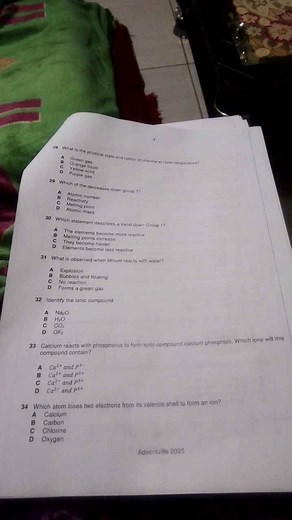 What is the physical state and colour of chlorine at room tempe... | Filo
