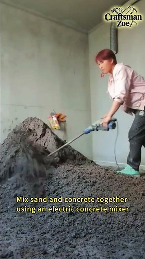 Mix sand and concrete together using an electric concrete mixer