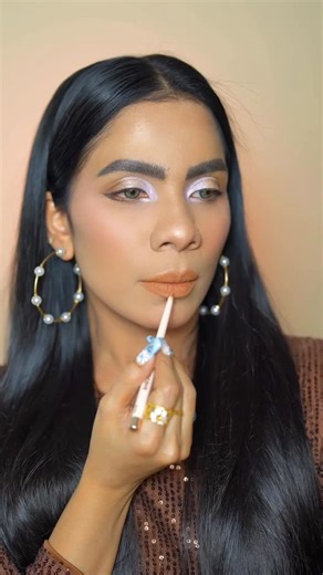 Aniqa Arsalan on Instagram: "Viral & Festive lips, anyone? 🌟 I’m loving this easy lip combo using the @sheglam_official Dazzler Glitter LipKit ! 🎄✨ Here’s the magic formula: 1️⃣ Line & prime with the lip liner 2️⃣ Apply glue (quickly, it’s sticky! 😅) 3️⃣ Tap on glitter ✨ Voilà! Try it and make your lips holiday-ready 💖 #HolidayLips #sheglam #GlitterLips #viralglitterlips"