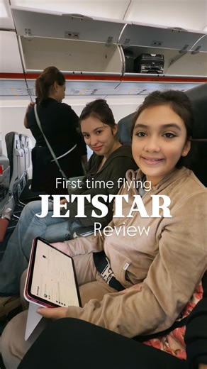 First time flying Jetstar from Australia to New Zealand ✈️🇳🇿 This is Cairns to Christchurch, booked last minute, and going in with very low expectations… so here’s the honest review. Jetstar is definitely a no frills budget airline, but for a 5 hour flight, the seat spacing was actually better than we expected. We originally selected seats in the back, but somehow our family got moved forward and Alex ended up with extra legroom. No idea how that happened, but the surprise upgrade was really n