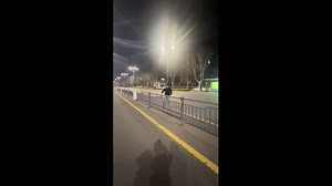Man falls after jumping road fence in Henan, China