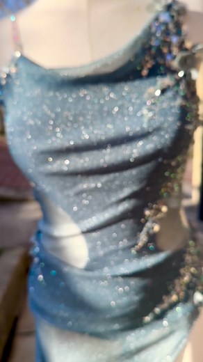 3.8K views · 37 reactions | The SPARKLING slip dress  ‘Tis the season for sparkle and were kind of wishing we could just wear this piece out! Stunning, petrol blue/grey dress and the fabric for this one is entirely sparkly! The straps form a stunning, starburst back and we used a lovely silvery lace for the decoration | The Bunheads | Facebook