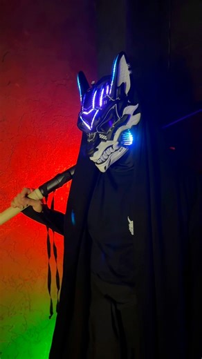 One of our absolute hits — Cyberpunk Kitsune Mask with Fans & RGB LED lights 🔴 Meet our Black & White Cyberpunk mask — the ultimate techwear accessory for those who lov futuristic fashion, cyberpunk cosplay, and LED costume masks. This handmade cyberpunk mask is crafted from durable, hypoallergenic resin, hand-painted with acrylics, and finished with a matte epoxy coating for a sleek, futuristic look. Inside, there’s soft inner padding for all-day comfort, plus a secure strap system to keep it 
