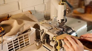 Process of making leather craftwork. Worker using skiving machine