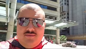 Pro-Putin 'Aussie Cossack' Arrested After Pushing Elderly Man Down Steps