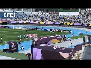 North Korean women footballers lift the title and proudly display their flag in South Korea