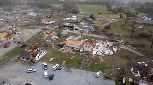 Homes flattened and trees down after tornado sweeps through Arkansas city