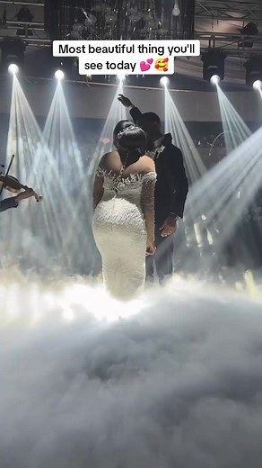 Couple's Elegant Slow Dance at Wedding Ceremony