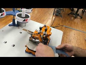 Sewing on the Merrow MG 2DNR 1 Purl machine