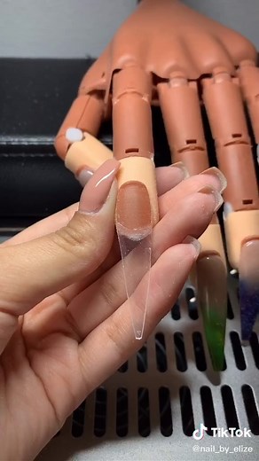 Applying tips to this practice hand, in case you’re struggling :) #nails #acrylicnails #fyp #foryoupage #nailtech #handpainted #tutorial