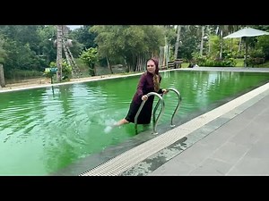 White Nike sneakers, purple dress, green water • Wetlook girl swimming in pool • Wet dress