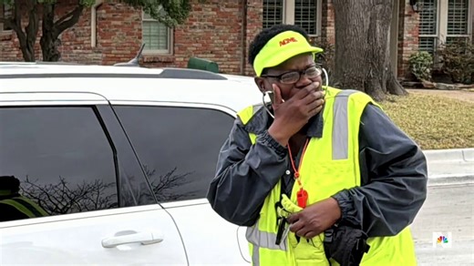 Elementary school 'carpool dads' surprise crossing guard with new car
