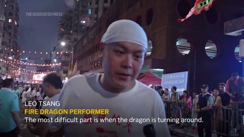 Dragon made of 10,000 incense sticks dances through Hong Kong