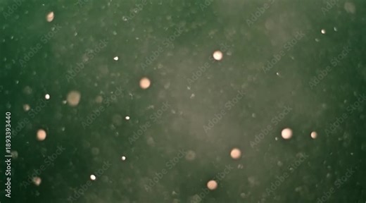 Cinematic abstract backgrounds featuring floating green particles, underwater bubbles, and exploding debris.