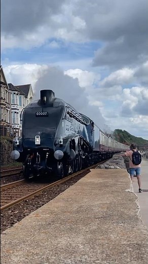 British Railway A4 Pacific Sir Nigel Gresley lifts the camera on the seawall at Dawlish,at speed
