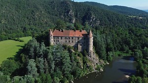 This incredible thousand-year-old castle perched above a wild river is just 2 hours from Lyon!