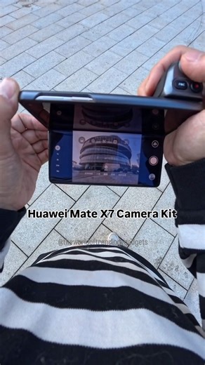 The World Of Trending Gadgets on Instagram: "Huawei Mate X7 fold looks amazing 😍 with camera kit module. It's feels like you are using a professional camera. #huaweimatex7 #huawei #trending #tech"