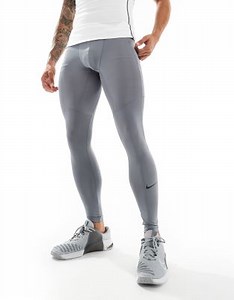 Nike Pro Training Dri-FIT compression leggings in dark grey | ASOS