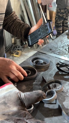 Creating Identical Iron Flower Components in Metalwork