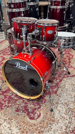 $795 Pearl Vision birch ruby red lacquer 5pc drum set. Pro level sound and great snare! Excellent used condition with a few scuffs. #pearl #vision 22x18,16x16,12x9,10x8,14x5 sensitone steel snare. Shells: 100% birch, 6-ply (7.5mm), providing focused tone and projection. Sound Profile: Bright attack, clear high frequencies, scooped mids, and strong low-end punch, ideal for cutting through a mix. Hardware: Features like masters bridge lugs. Pearl superhoops. No stands included | Drum Flip