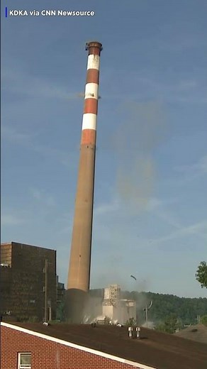 Smokestacks implode
