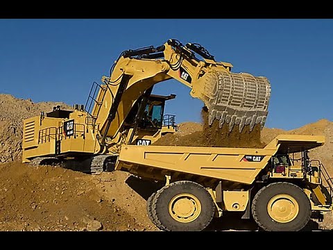 300 ton Cat 6020B Excavator Loading Trucks