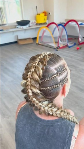 This isn’t your ordinary braid—this is a braid on braid masterpiece giving full-on warrior energy.