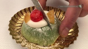 Cassata is a traditional Sicilian cake made of sweet ricotta (traditionally from sheep milk), sponge cake, marzipan and candied fruit. Despite the apparent simplicity of the recipe, there are several local variations, each city in Sicily has its own recipe. The origins of the Cassata have to be sought back to the Arab occupation in Sicily (9th century), during which various typical Siclian ingredients were introduced: sugar cane, lemon, cedar, bitter orange, mandarin. These ingredients, along wi