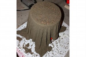 She Takes A Towel And Dips It In Cement. After It Dries She Turns It Over And Reveals THIS. AMAZING!