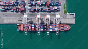 time lapse Cargo Container Ship at international customs sea port. Crane loading cargo working at industry port. working freight shipping import export shipping concept.
