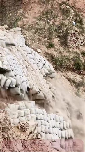 Watch Sand "Dance" by Itself! The Stunning Moment Sand Flows Down a Sandbag Slope