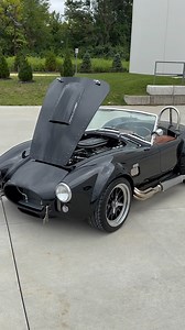 17K views · 997 reactions | The Outlaw 鸞 1965 @backdraft_racing Cobra  Black w/ Ghost Black Stripes / Saddle Diamond Stitch Interior / @prestige_moto 427 MPI Fuel Injection 500HP #JMCCobra #shelby #cobra Full listing hitting soon  ☎️609-871-2700 JMCCobra.com | Jonathan Motorcars | Facebook