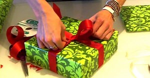 How To Really Wrap A Christmas Present So It's Crisp, Neat, And Stylish
