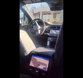Waymo vehicle circling parking lot with passenger inside captured on video