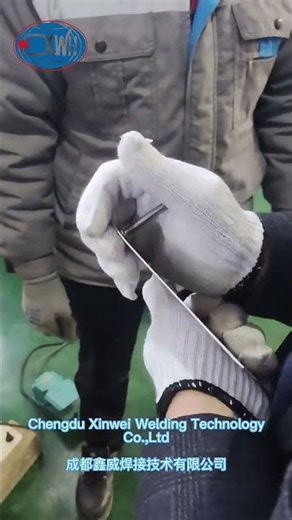 Welding the screw bolt with the stationary spot welder