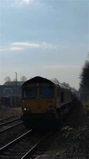GBRf 66 750 Avonmouth to Clitheroe Castle Cement at Clitheroe as Rochdale bound passenger departs