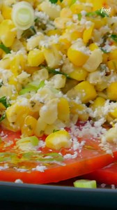 Chili-lime creamed corn with garden tomatoes and crumbly Cotija cheese?! This is in the running for our favorite summer side dish 🤩🌽 Catch Michael D. Symon hosting #24in24: Last Chef Standing, TOMORROW @ 8|7c! Get the recipe: https://foodtv.com/3YGjMVC | Food Network