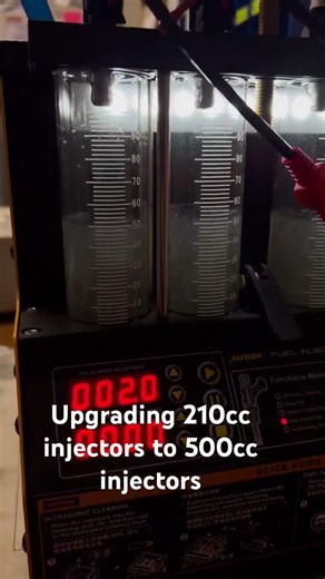 Flowing injectors after decap to make sure I have even flowing injectors .