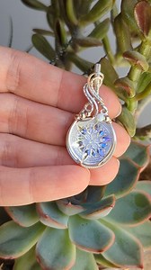 6.2K views · 1K reactions | ❄️ This pressed glass snowflake cabochon is so beautiful and sparkly! I wrapped it up in sterling silver wire and it will be available in Sunday's shop update. #riojeweler #wirewrappedpendant #winterjewelry #snowflakependant | OxanaCrafts | Facebook