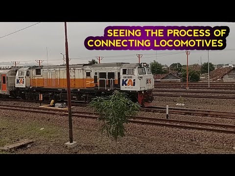 SEEING THE PROCESS OF CONNECTING LOCOMOTIVES AND RAILWAY CARRIAGES