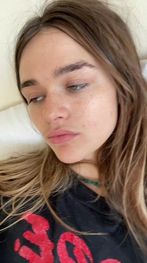 Cuddling in a Cozy Bedroom Setting