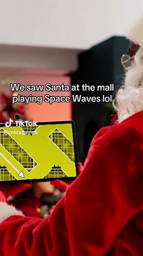 Santa Claus Playing Space Waves at the Mall