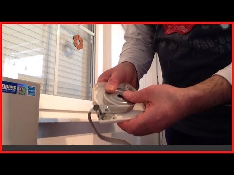 Changing roller shutter belt - re-tensioning the spring in the belt winder