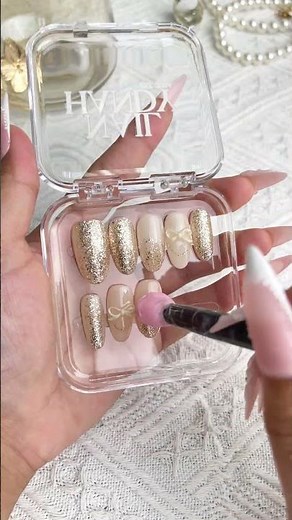Full gold glitter with bow accents 🎀#nailart #nailtrend #nailtutorial #naildesign #nailart