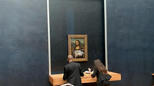 Man in Wig Throws Cake at Glass Protecting Mona Lisa