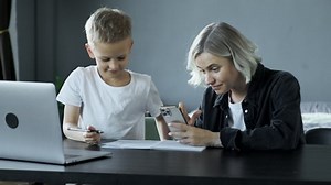 Mother Helping Son Homework Sitting Desk Stock Footage Video (100% Royalty-free) 1076306483 | Shutterstock